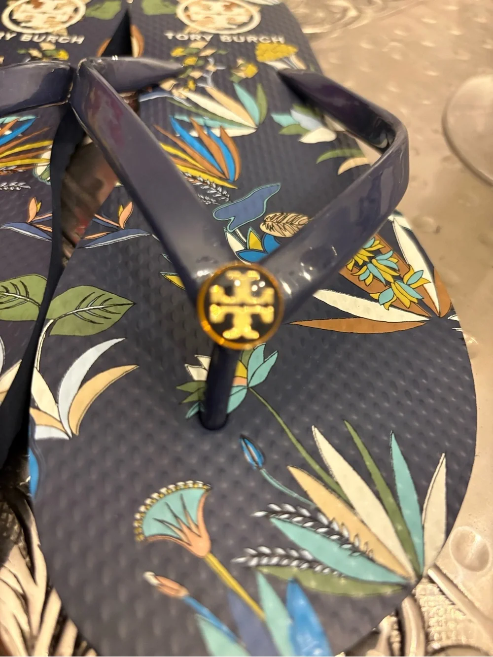 New Tory Burch Navy Floral Flip Flops with Gold Logo $100